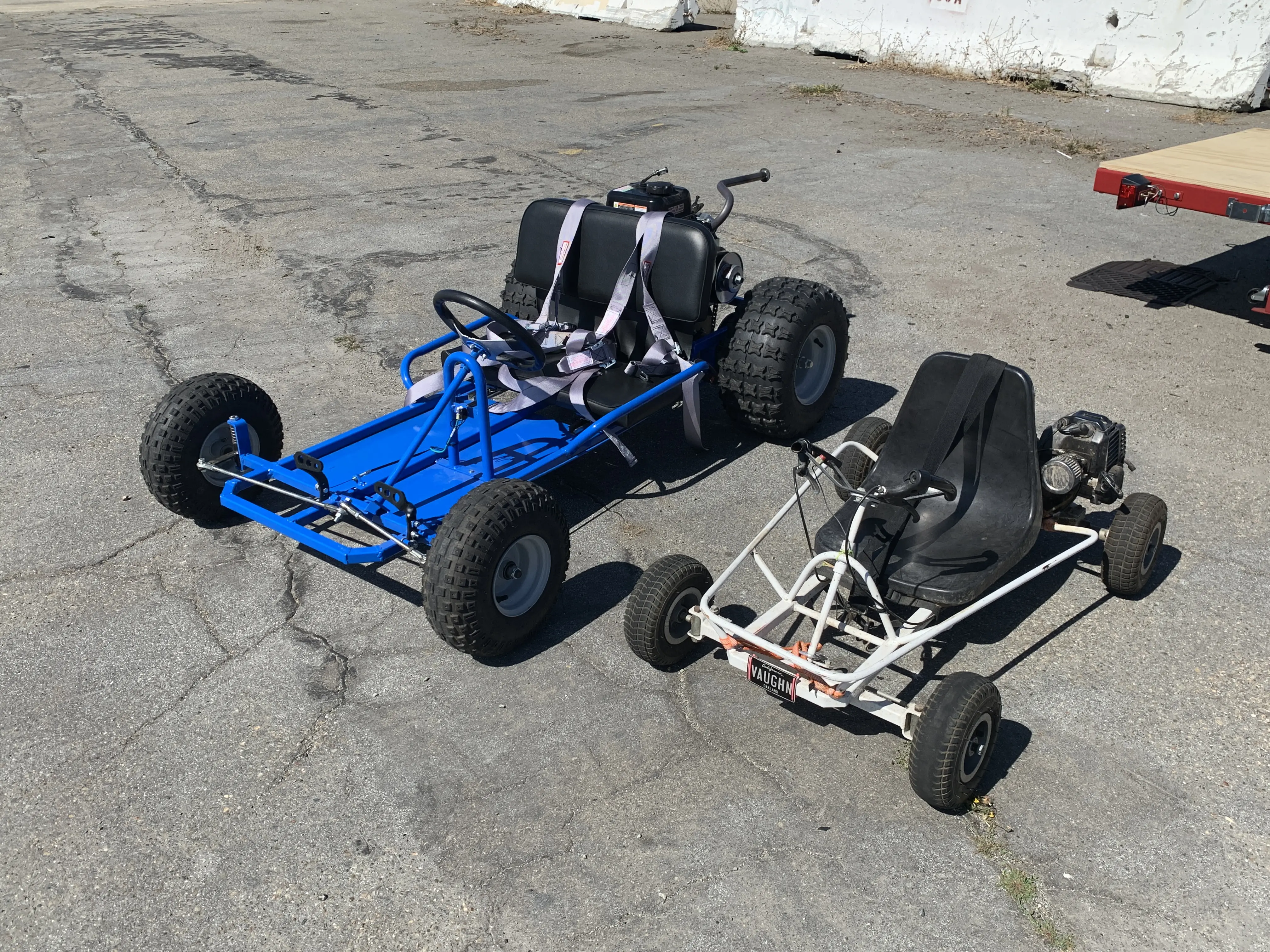 Image of blue Go-Kart in front of a city skyline